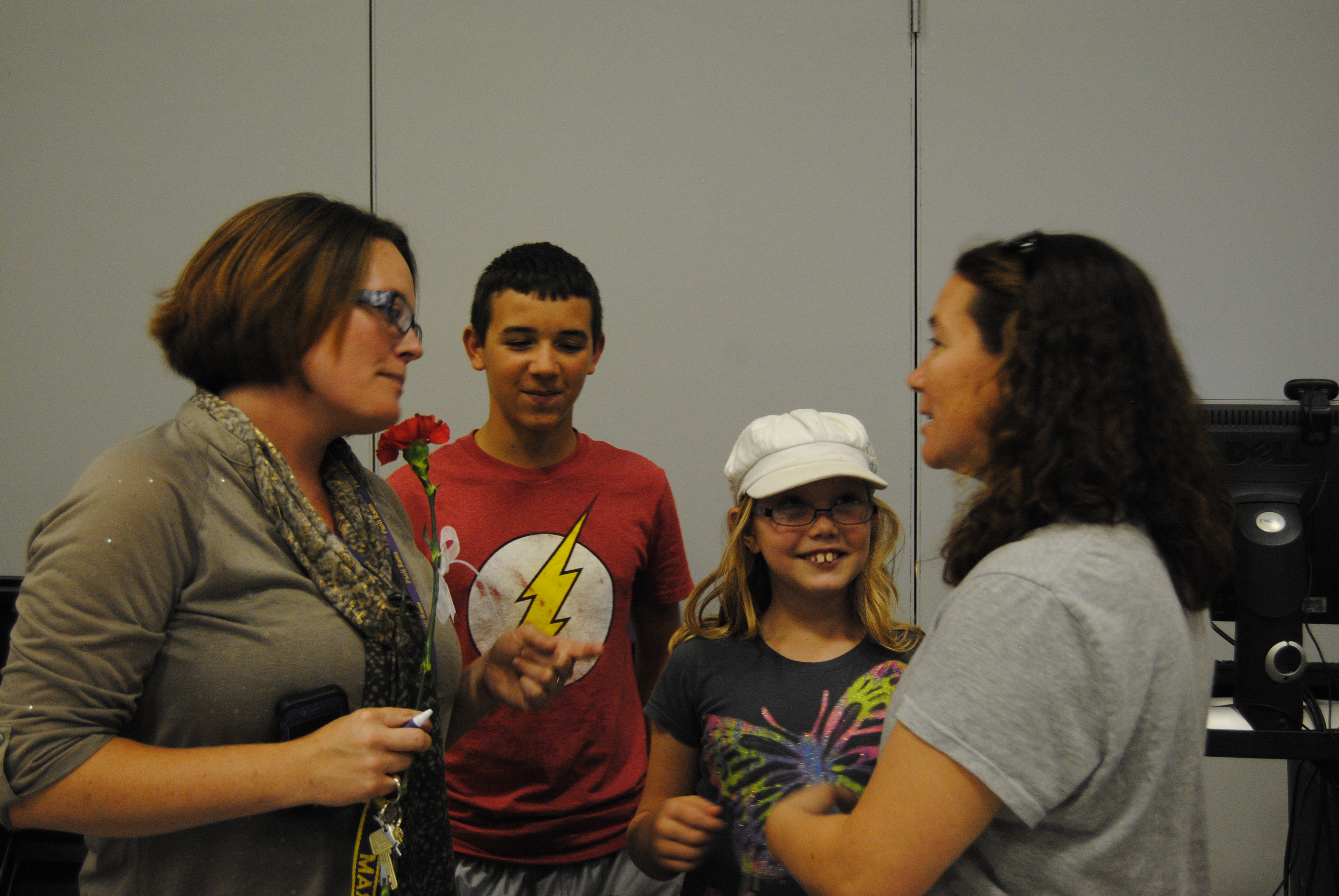 Photo 3: Paoli High School’s new  Vice Principal Amanda Crews answers eighth grader Keegan Anderson’s questions. 