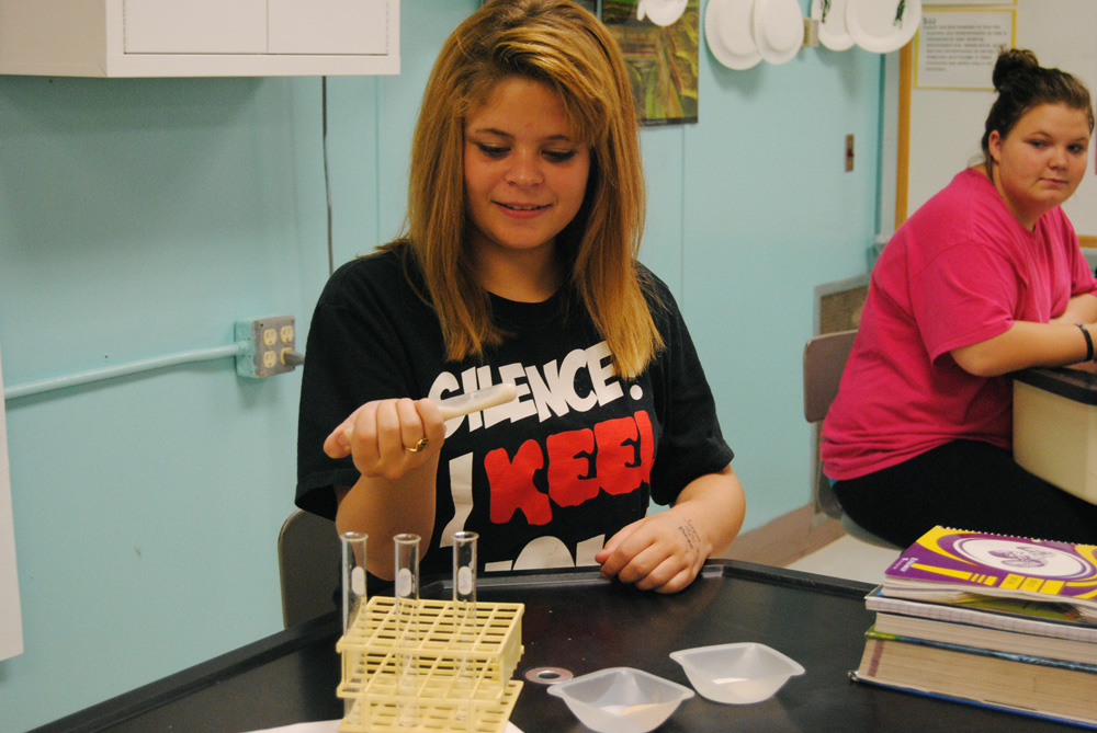 Freshman Harley Lynd does her first lab today in Biology Teacher Melissa Higgins' class. 